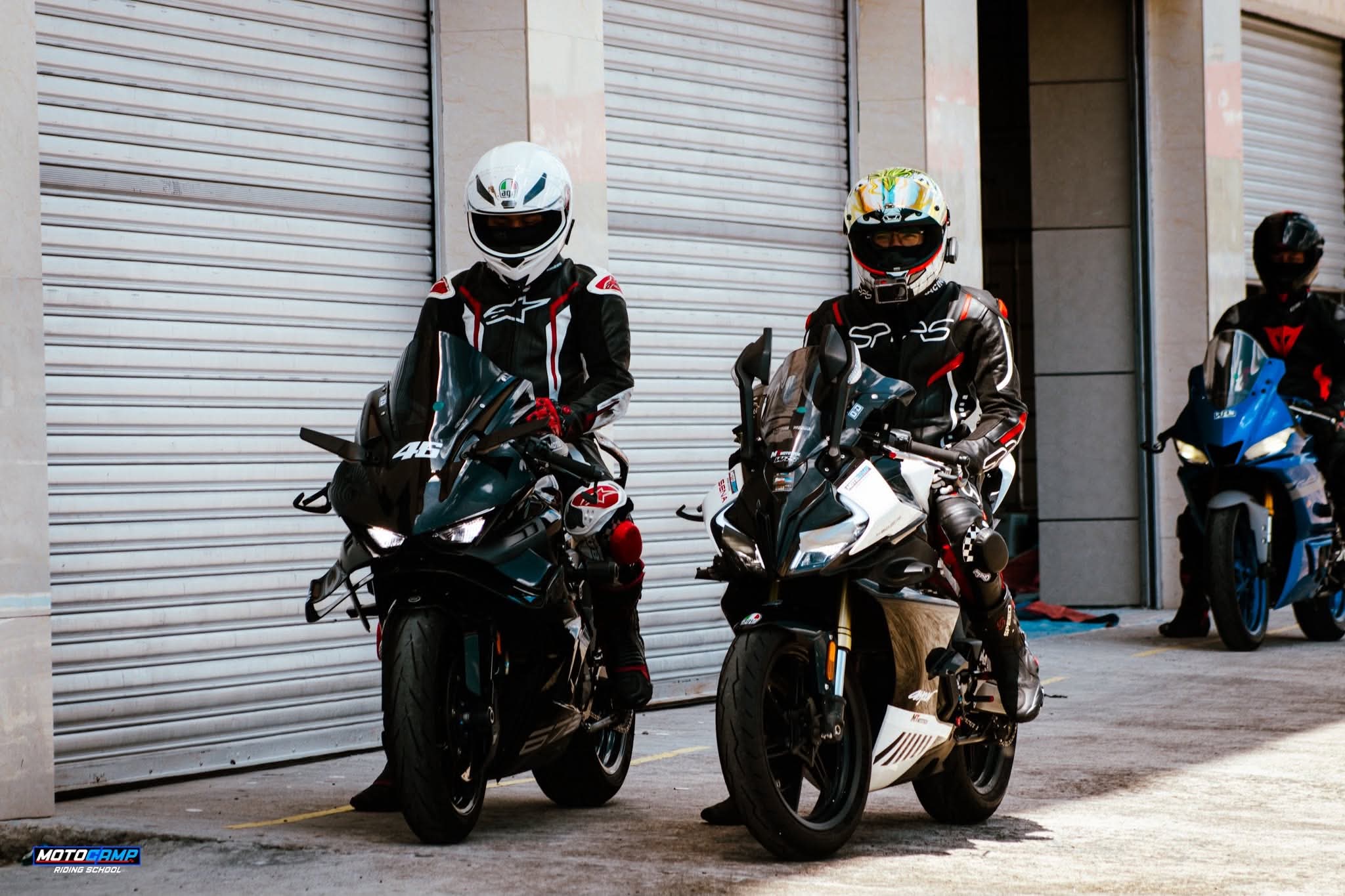 Riders staged in the pit lane